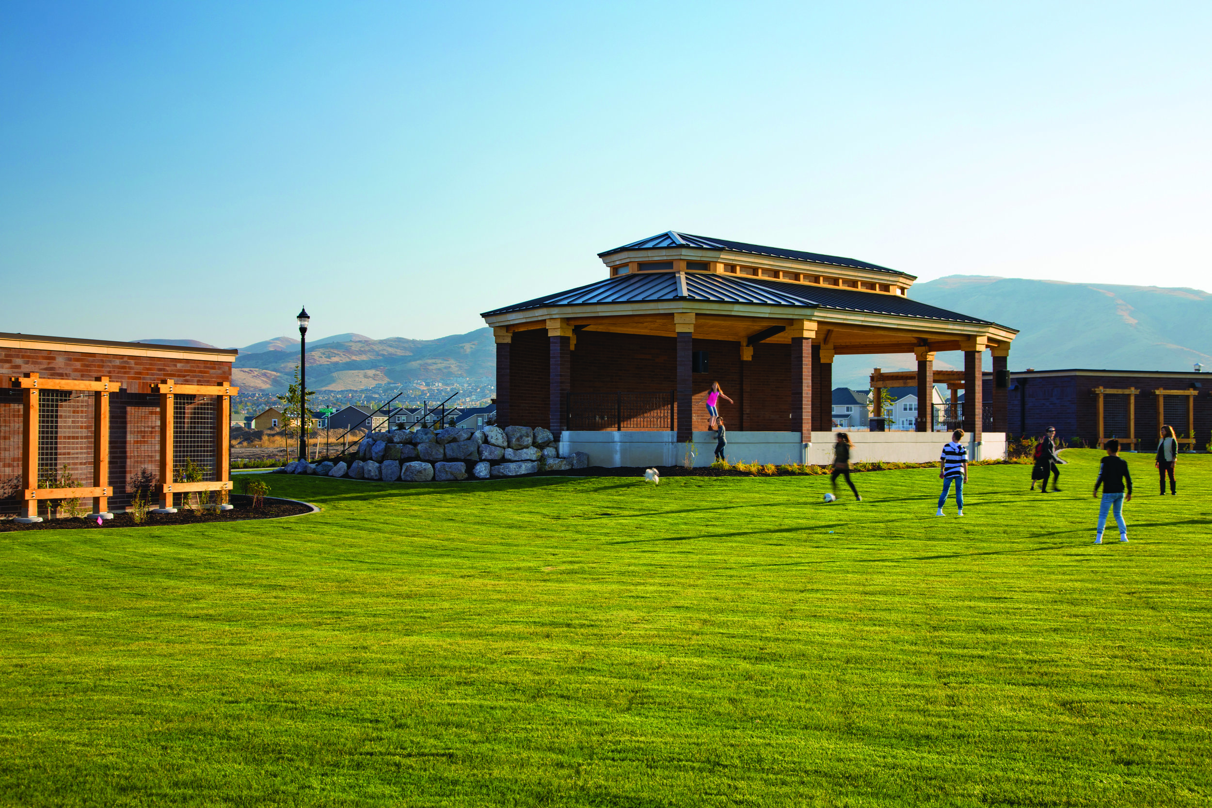  The Band Stand prominently stands at the south end of the Towne Center and is flanked by restrooms, staging, and support buildings. The Amphitheater Lawn gently slopes toward the stage providing a large gathering area for performances and events. 