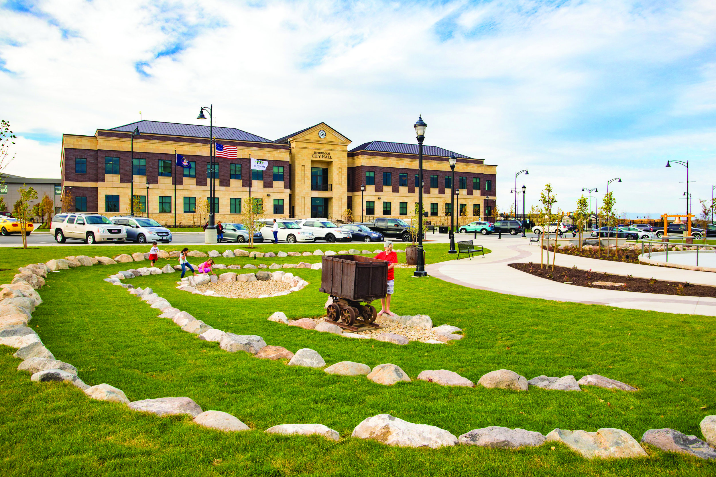  A representation of nearby Kennecott Copper Mine is shown here on the northwest edge of the history walk. Depictions of other historical elements including old Fort Herriman and Dryland Farming are also located along the History Walk, which can be i